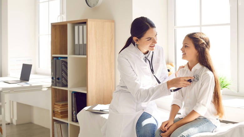 doctor seeing a patient