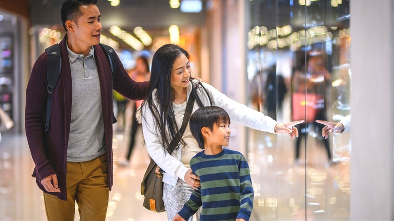 Family of three mall shopping