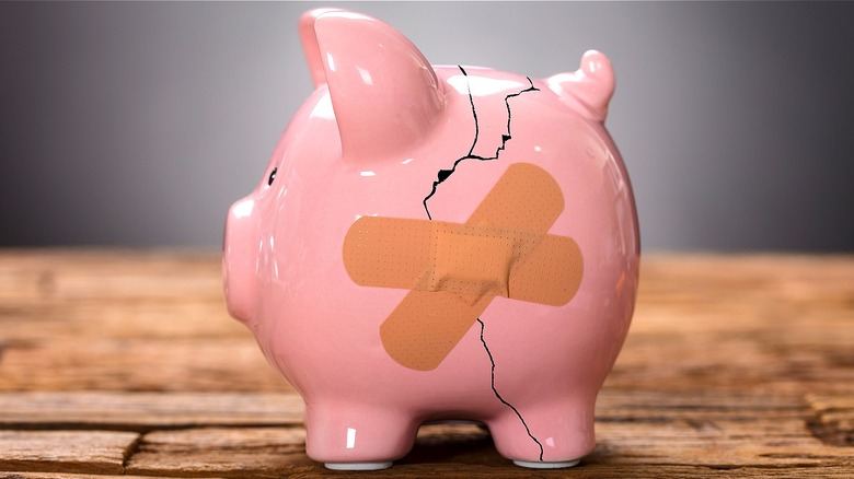 Hammer and busted piggy bank