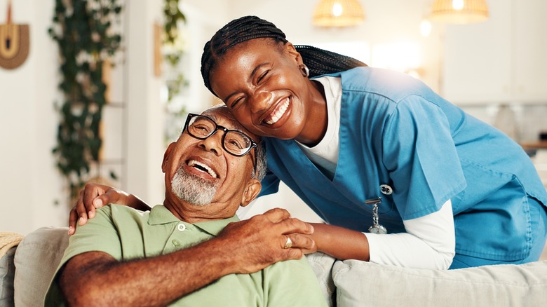 Man and nurse hugging
