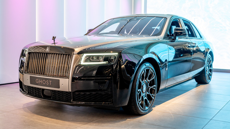 A Rolls Royce Ghost is displayed at Rolls-Royce Motor Cars dealership showroom in Mayfair
