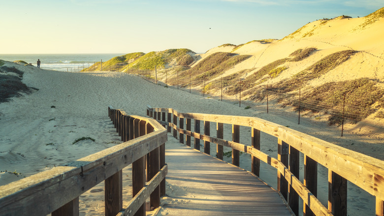 A boardwalk leading to a beach in Oceano, California