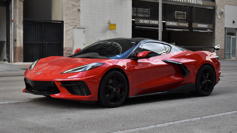 A red eight-generation Chevrolet Corvette 3LT on the street