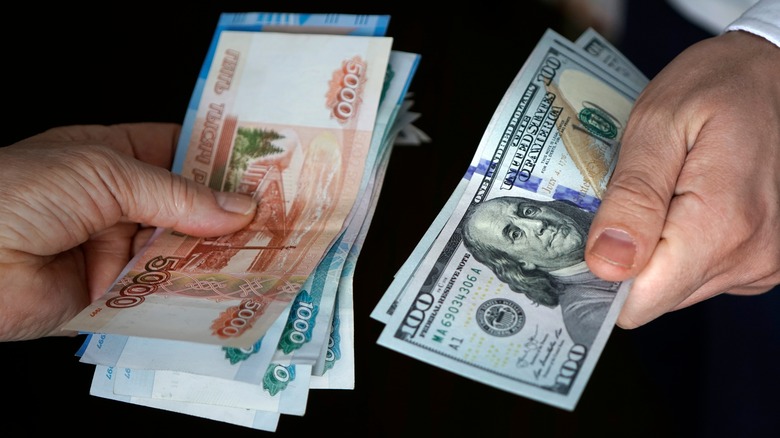 People exchanging currency