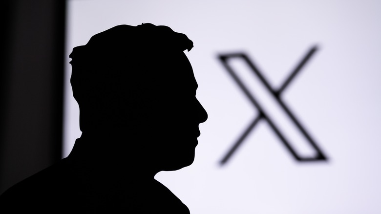 Billionaire Elon Musk by X sign