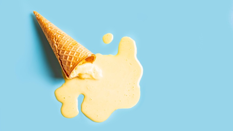Ice cream melting out of a cone