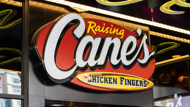 Raising Cane's sign outside a restaurant