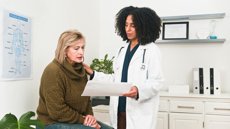 Doctor consults patient in a clinic