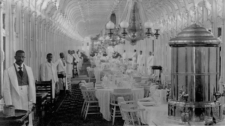 Black waiters in restaurant