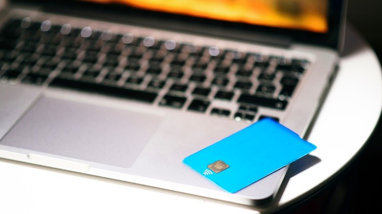 Credit card on open laptop
