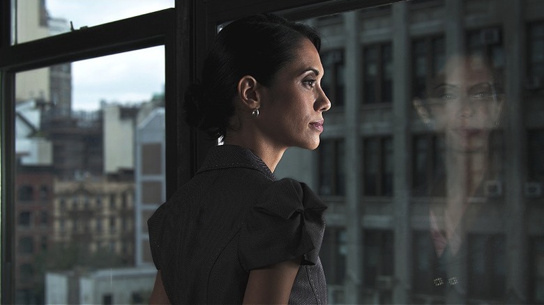 Person staring out a window