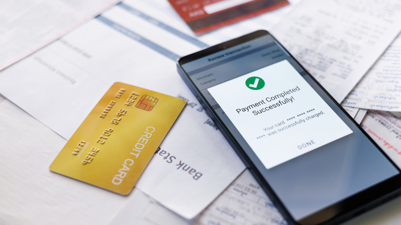 Phone showing screen of a successful credit card payment.