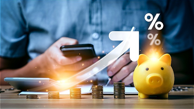 piggy bank with percentage symbols