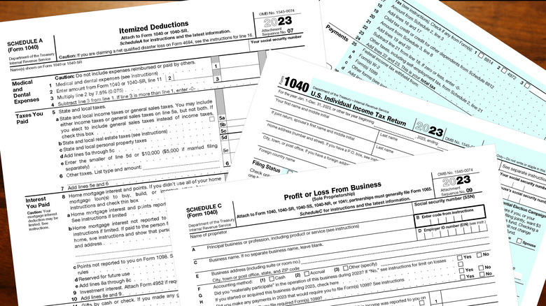 tax forms including itemized deduction paperwork
