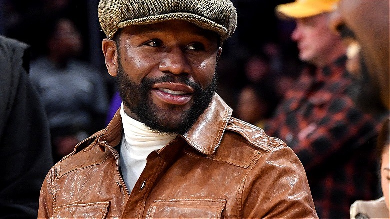 Hatted Floyd Mayweather turns
