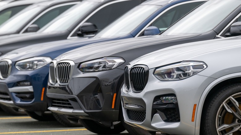 A row of BMW sports utility vehicles that may have been