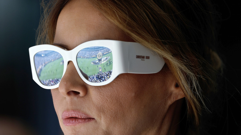 Melania Trump wearing Dior sunglasses and looking forward