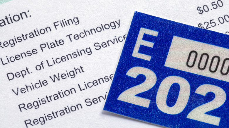 Vehicle registration paperwork and license plate sticker