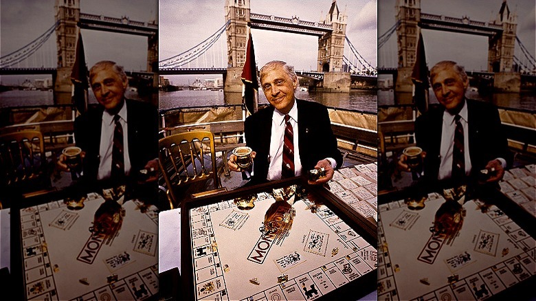 Sidney Mobell toasts his board