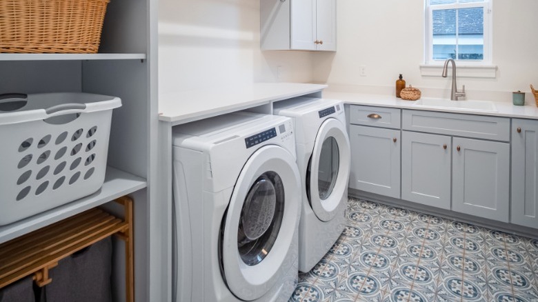 Front load washer and dryer set in a home's new laundry room
