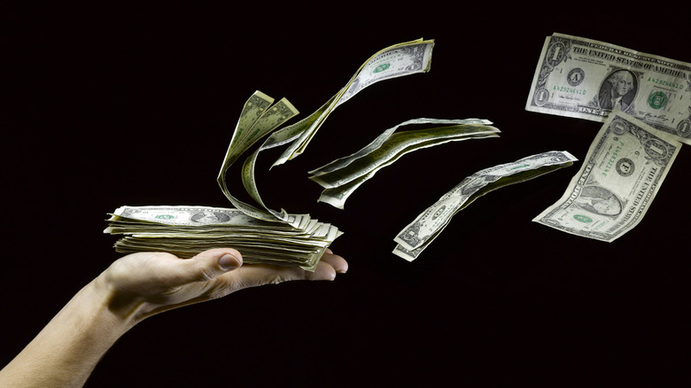 Money flying away