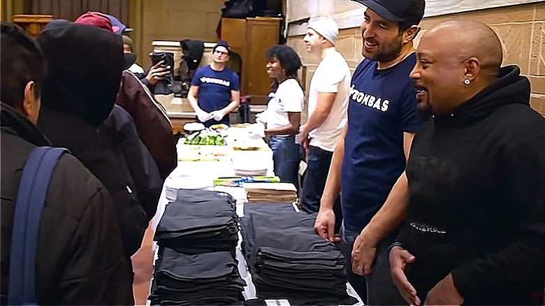 Daymond John donating clothes