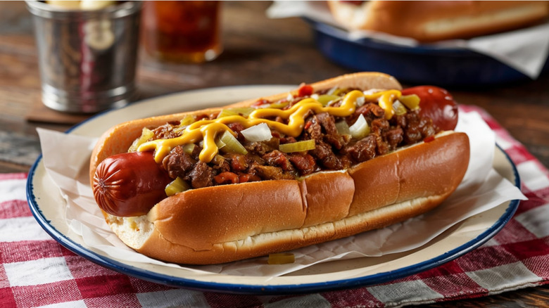 Chili dog with onions and mustard