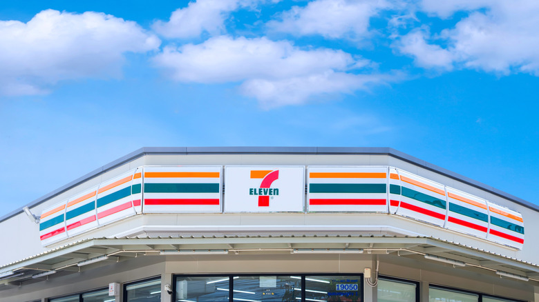 The exterior of a 7-Eleven location on a sunny day