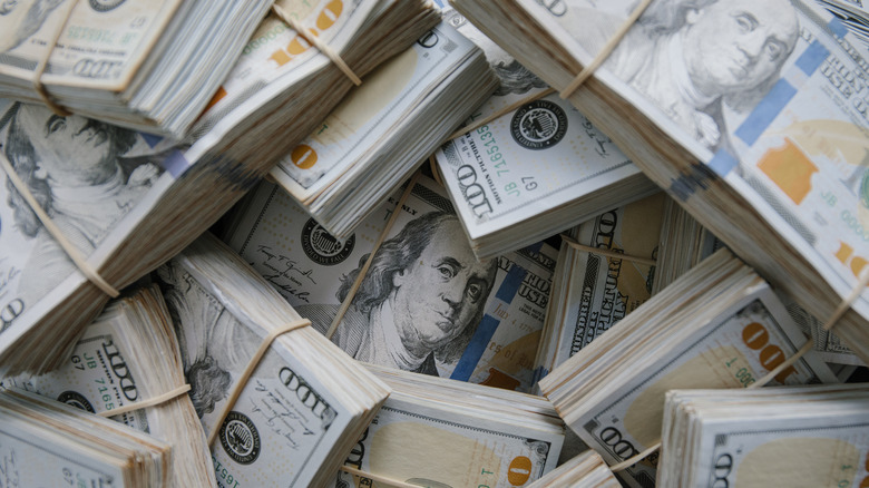 Pile of 100 dollar bills