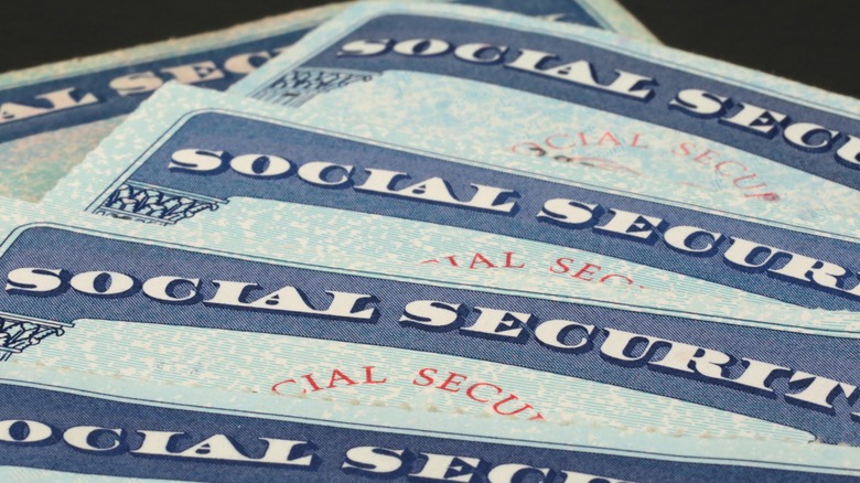 Social security cards stacked on top of eachother