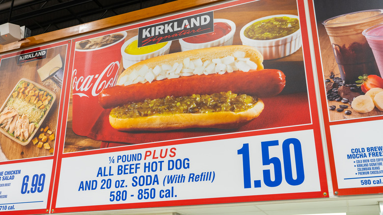 A giant sign advertises a $1.50 hot dog special in the Costco food court
