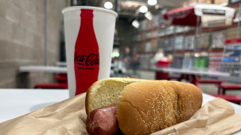 Costco's hot dog and Coca-Cola drink special on a table in the food court inside