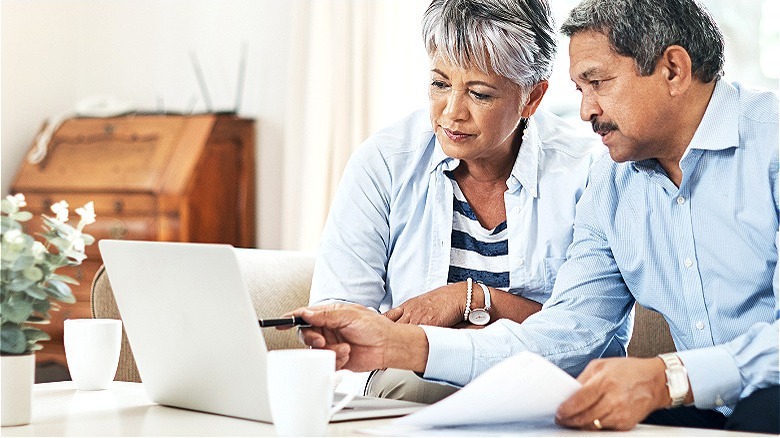 Senior couple using laptop computer