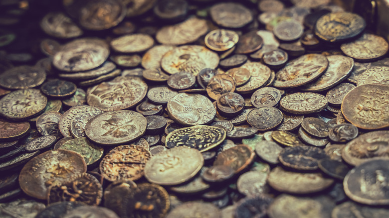 Piles of silver and gold coins
