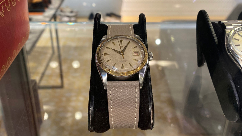 A Rolex timepiece displayed at a secondhand accessory store