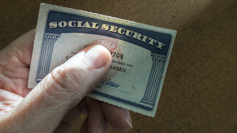 Person holding a Social Security card