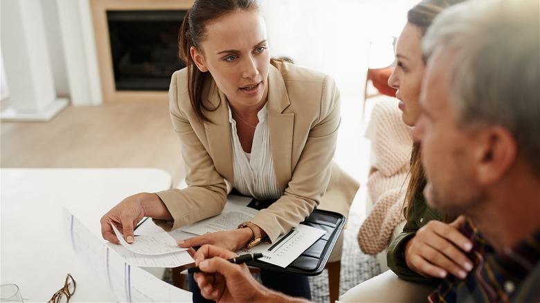 Financial adviser consulting couple