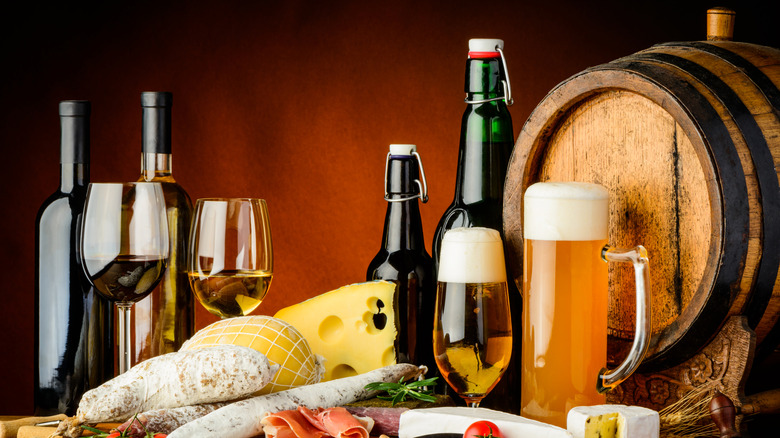 An array of wine, beer, traditional food, cheese and sausages