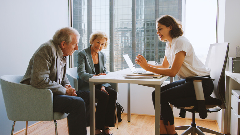 Senior couple meeting with a financial planner