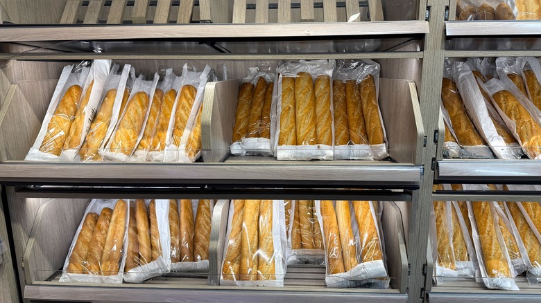 A display case of baguettes