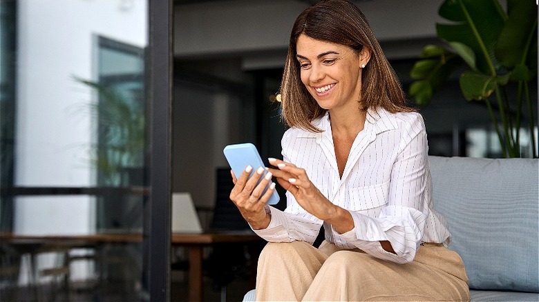 Person reading news on phone