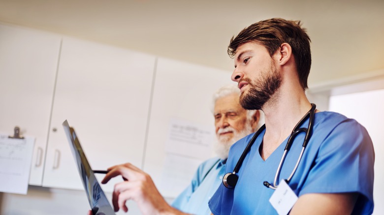 Senior patient, people and healthcare with radiology scan