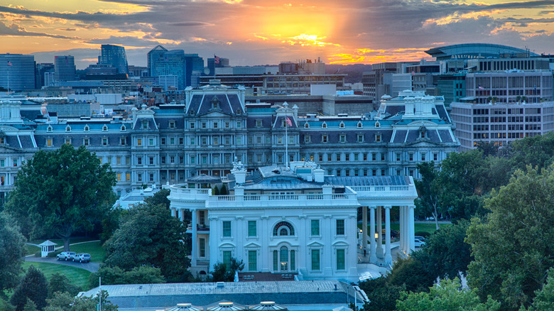 The US Treasury building, White House, and Eisenhower Executive Office building at sunset as seen from the roof top of a near by building.