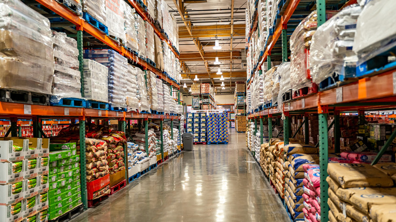 Empty Costco aisle stocked with various products