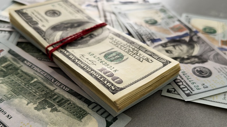 Pile of one-hundred-dollar bills.