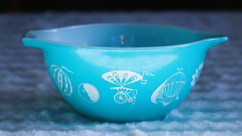 Blue vintage Pyrex mixing bowl printed with rare hot air balloons design