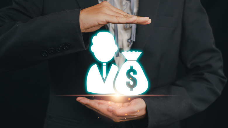 image of money bag and person figure