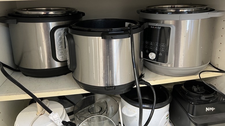 small appliances in a cabinet