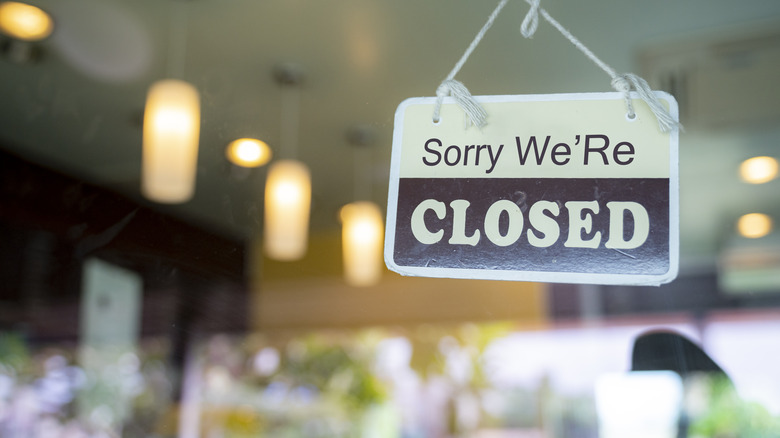 Closed sign in store window