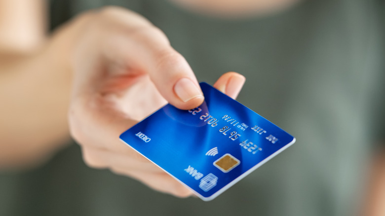 Person paying with credit card